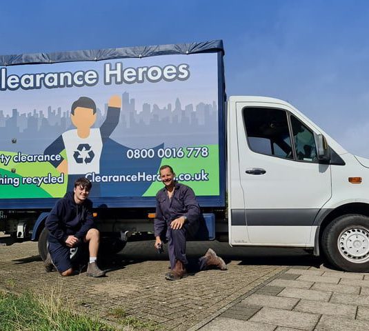 Clearance Heroes Team In Front of Van